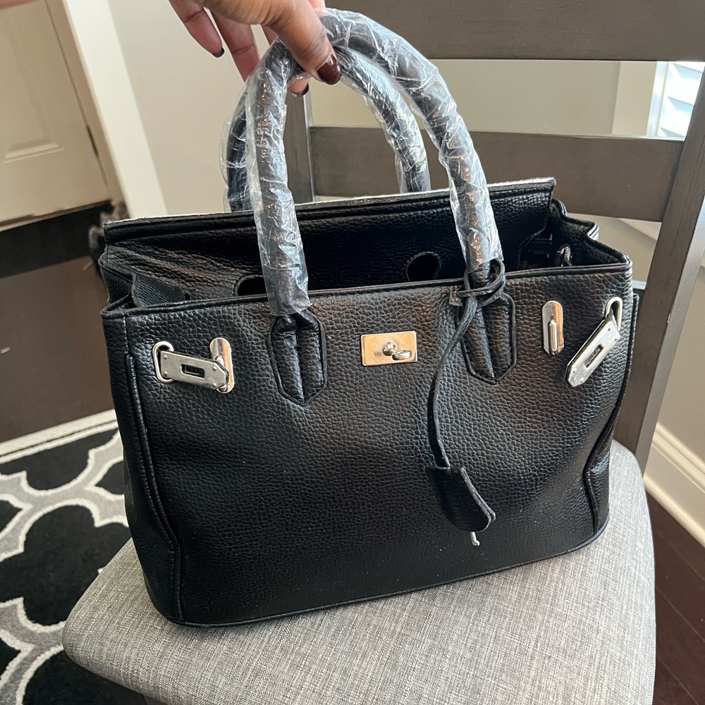 Buti Black leather bag. Silver hardware, slouchy -Black interior zipper +pockets